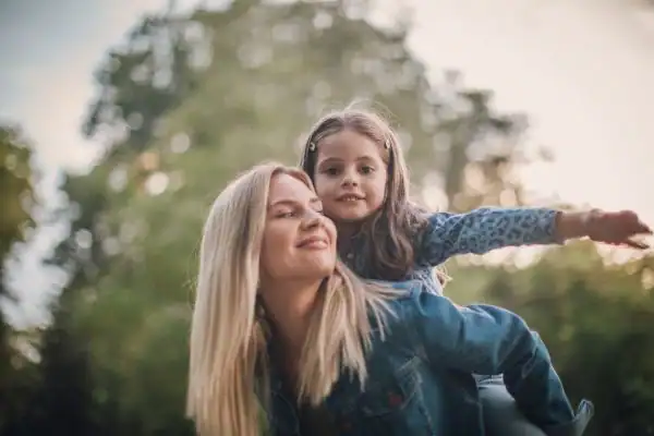 happy mum and daughter following mediation to resolve parental alienation Carlisle